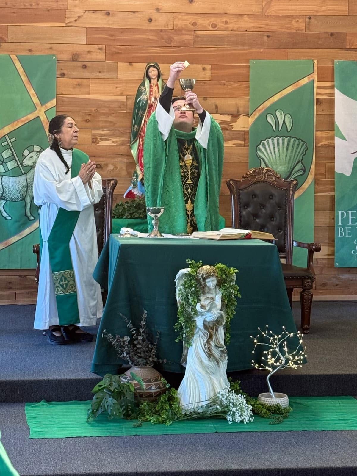 Celebrating the Eucharist at Holy Spirit Catholic Church.